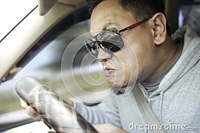 Temperamental Driver Concept, Angry Man Speeding Dangerously Stock Photo