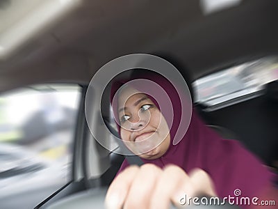 Temperamental Driver Concept, Angry Woman in Traffic Jam Stock Photo