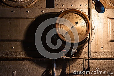 Temperature Gage lit up by single light Editorial Stock Photo