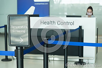 Temperature screening sign at airport Stock Photo