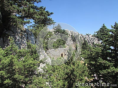 Templar castle in northern Cyprus, 12th century. An impregnable fortress built of wild stone on an inaccessible rock. Stock Photo