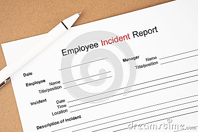 The Template of an Employee incident report form document and and pen on wooden background Stock Photo