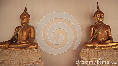 Gold Buddhas With Smiling Face And Wall Stock Photo