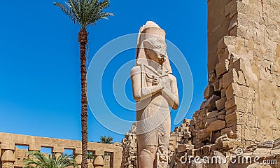 Ancient Egyptian temple Amon Ra in Luxor with columns and beautiful bas-reliefs Pharaoh`s cult Editorial Stock Photo