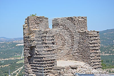 The temple of Athena and Assos castle, where blue and green goose mountains. Canakkale, Turkey Stock Photo