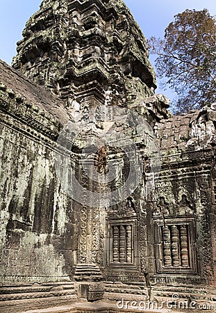 The temple with a bas-relief of a dinosaur on a column in the center of the photo.Siem Reap, Cambodia Stock Photo
