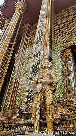 Temple with classical glass decoration srt and golden Yaksa giant in guarding royal temple Stock Photo