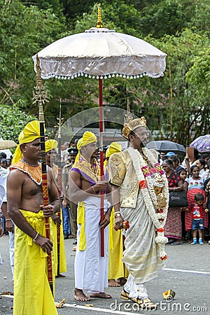 A Temple Custodian parades during the Day Perahera. Editorial Stock Photo