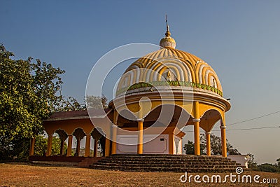 Temple in Goa, Arambol, India. Yellow small temple Stock Photo