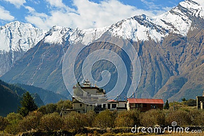A temple near Larjung village on the Annapurna Circuit, Nepal. With the Dhaulagiri Range in the background Stock Photo