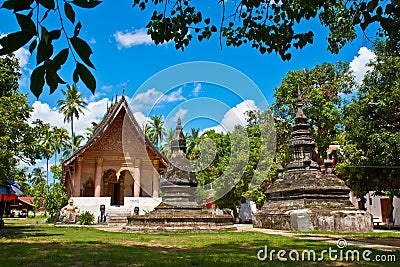 A temple Wat Aham with blue sky in Luang Prabang Stock Photo