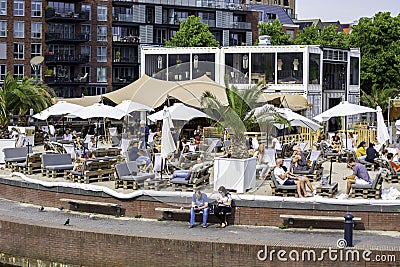 Temporary pop-up city beach club restaurant. Terrace with enough of space between tables following the rules of social distancing Editorial Stock Photo