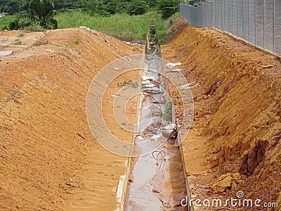 Temporary sediment and sludge filters installed at construction sites. Stock Photo