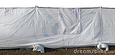 Temporary white plastic fence protects the quarantine zone during a pandemic isolated Stock Photo