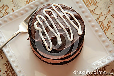 Tempting dessert of chocolate cake, with thick,creamy frosting Stock Photo