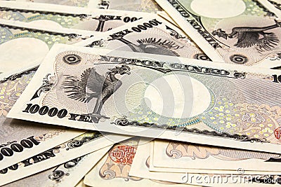 Ten thousands japanese yen bills Stock Photo