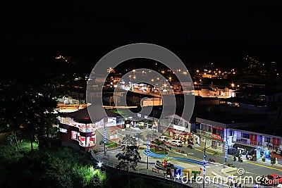 Tena, Ecuador the main plaza during the night brightly lit Editorial Stock Photo