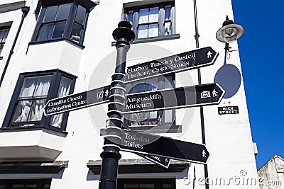 Tenby street signpost, Wales Editorial Stock Photo