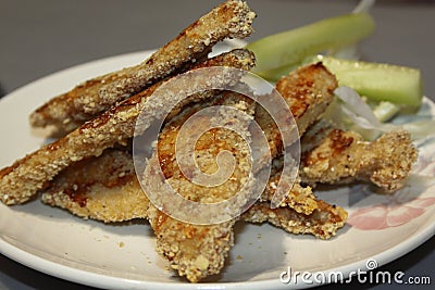 Tender chicken breaded with vegetables Stock Photo