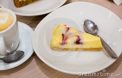 Cheesecake with cup of coffee Stock Photo