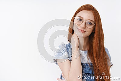 Tender romantic sweet redhead girl with blue eyes charming soft smile, touch neck modest, look shy cute, give lovely Stock Photo