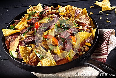 Tender spicy beef entrecote steak with nachos Stock Photo