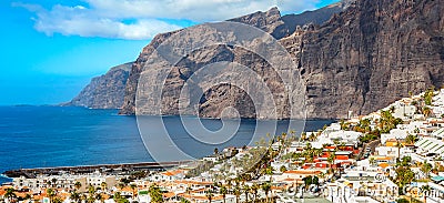 Tenerife island on a summer day panoramic landscape. Amazing aerial view on ocean and rocks. Seaside resort. Stock Photo