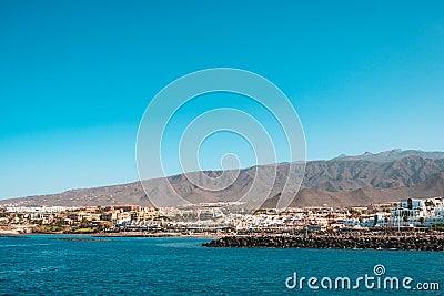 City and hotel buildings at coast of south Tenerife, Costa Adeje, view from ocean Editorial Stock Photo