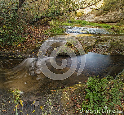 The Tenes river during autumnal season Stock Photo