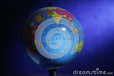 Tenggarong, Indonesia, June 29th 2021. Photo image of an earth globe on dark blue background Editorial Stock Photo