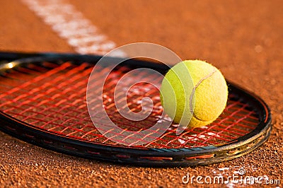 Tennis ball and racket Stock Photo