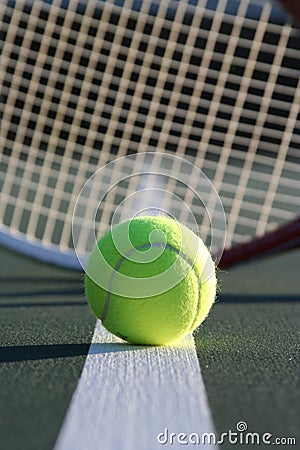 Tennis ball and racquet Stock Photo