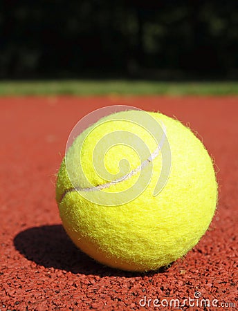 Tennis ball on a tennis court Stock Photo