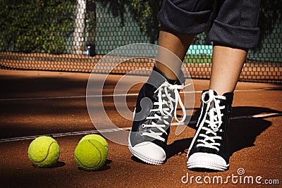 Tennis balls on a tennis court Stock Photo