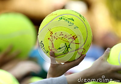 Tennis fans hold a ball Editorial Stock Photo