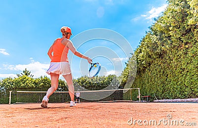tennis game on a clay outdoor court Stock Photo