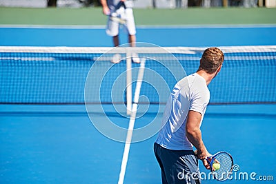 Tennis, game and men with fitness, challenge and competition with training and exercise. Players, friends and guys with Stock Photo