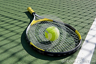 Tennis Racket and ball on white Stock Photo