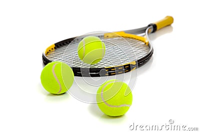 Tennis raquet with yellow balls on white Stock Photo