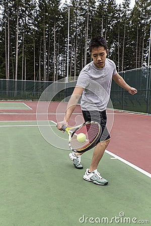 Tennis Single handed backhand Stock Photo