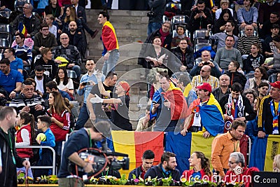 Tennis supporters, fans applauding in the tribune Editorial Stock Photo