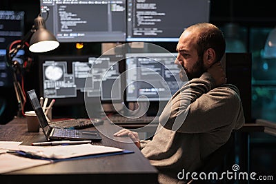 Tense stressed engineer feeling neck pressure Stock Photo