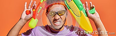 tensed african american man in sunglasses Stock Photo