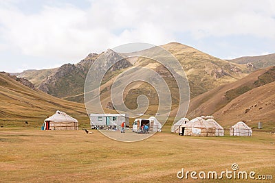 Tent camp with homes of the local nomadic asian people in a beautiful mountain valley Editorial Stock Photo