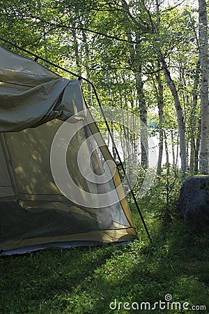 Tent in a campground at sunset Stock Photo