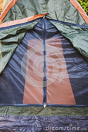 Tent in the forest close-up. Zipper. Picnic outside Stock Photo