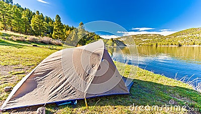 Tent Set Up on a beautiful day at Hauser Lake Montana Stock Photo
