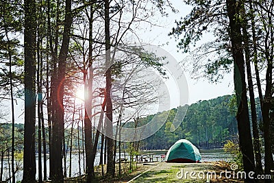 A tent at a waterfront campsite of Jordan Lake State Park at Poplar Point campground -- near Raleigh North Carolina Stock Photo