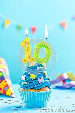 Tenth 10th birthday cupcake with candle. Card mockup. Stock Photo