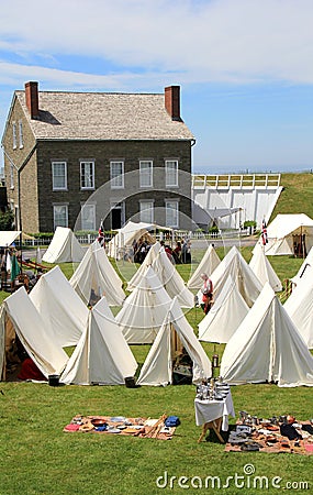 Tents set up across the lawns, ready for the reeanactments to begin, Fort Ontario, 2016 Editorial Stock Photo